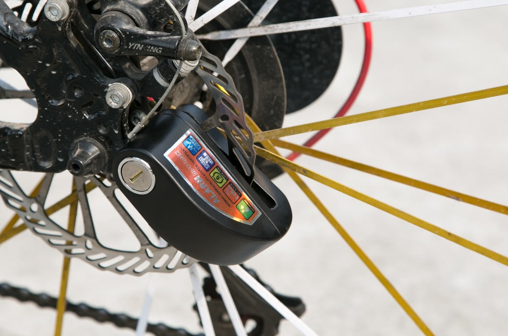 Motorcycle brake disc alarm - foldingup