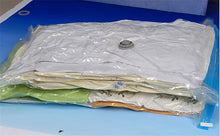 Load image into Gallery viewer, Vacuum Bag Storage - foldingup